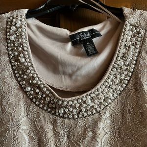 Champagne colored formal dress. Fitted dress with a flowy shear jacket for top